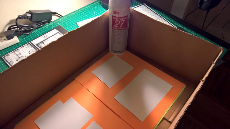 The cardboard box helps contain the spray. The photo was taken on my desk, but I highly recommend spraying somewhere else with goo ventilation to avoid mess.